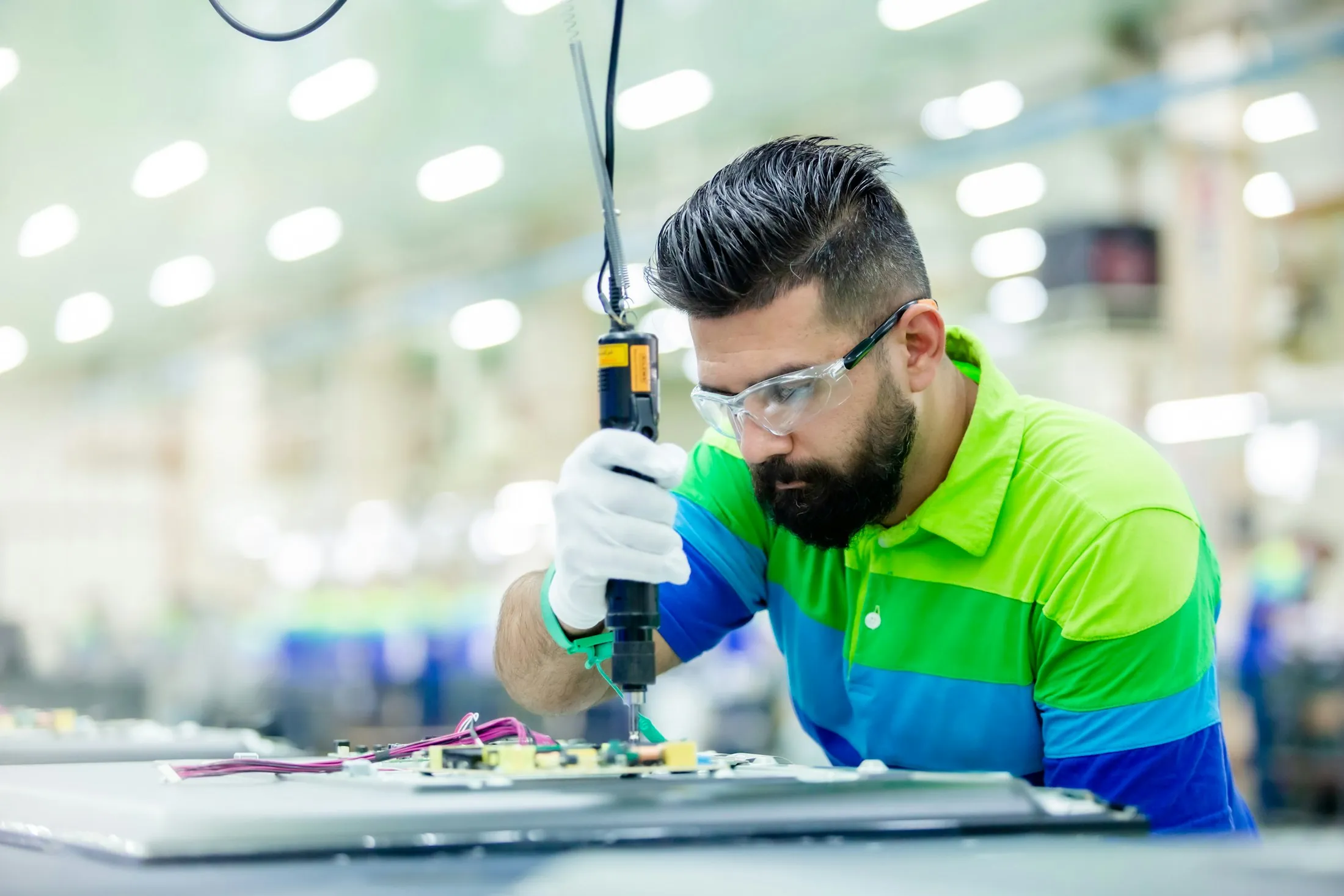 Engineer working on precision equipment