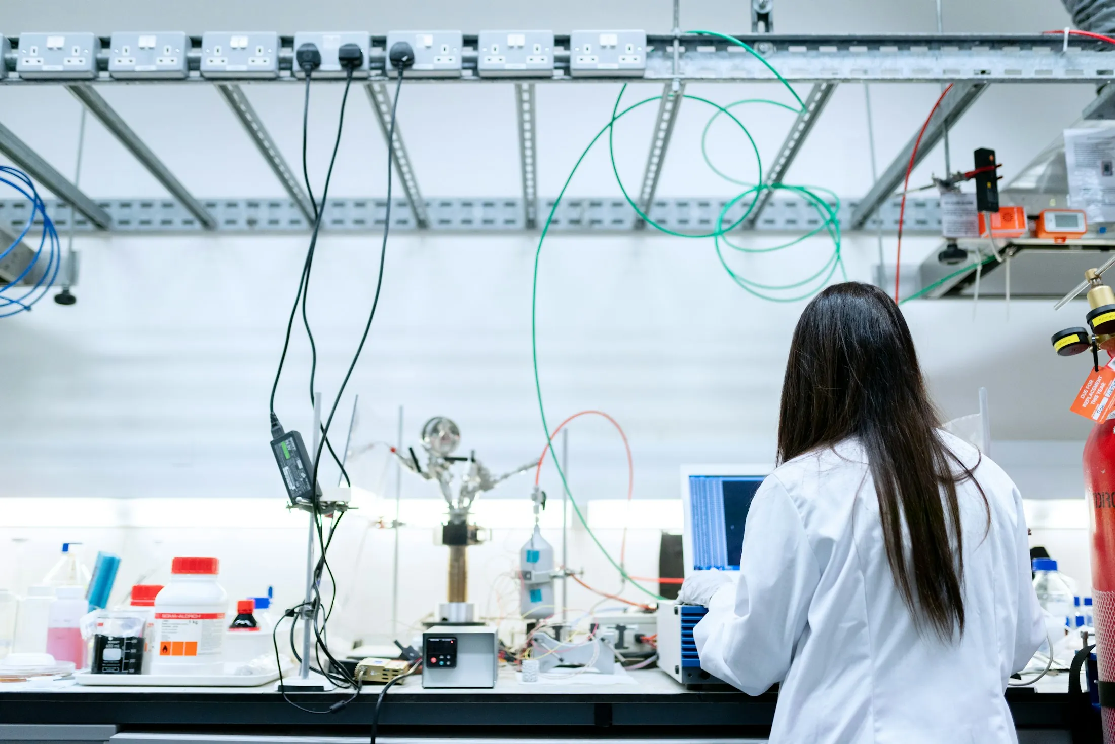 Scientist at an analytical laboratory bench